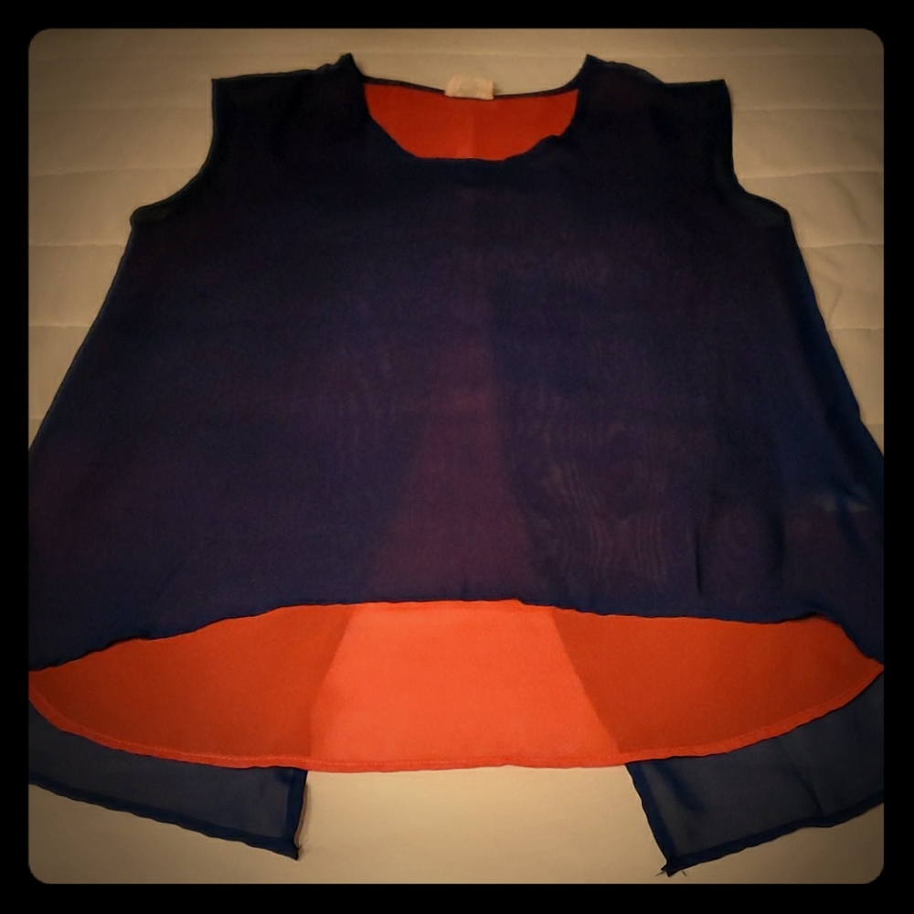 Perfect for Auburn fans!Sheer fly away blouse.